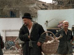 16 Kashgar Old City Street Scene 1993 Man Carrying Basket